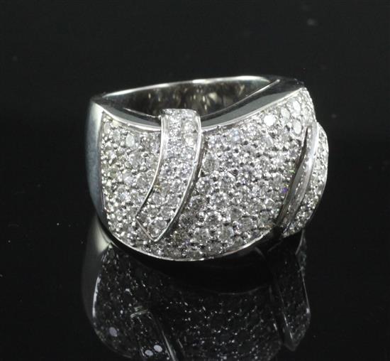 A white gold and diamond encrusted dress ring, size L.